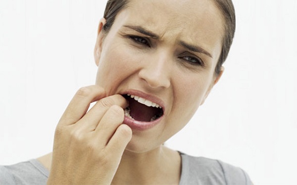 dấu hiệu của mọc răng khôn